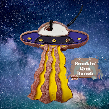 Purple spaceship freshie with yellow beams on galaxy background