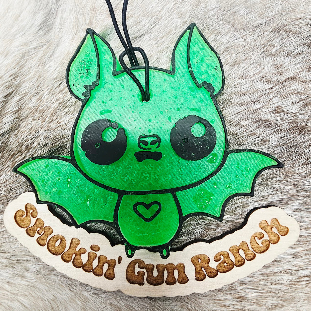 Green cartoon bat freshie with heart