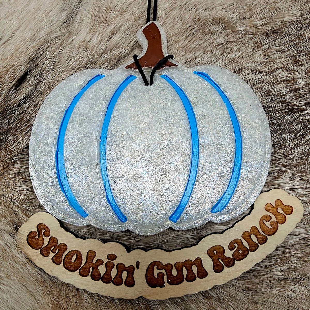 White pumpkin freshie with blue outline