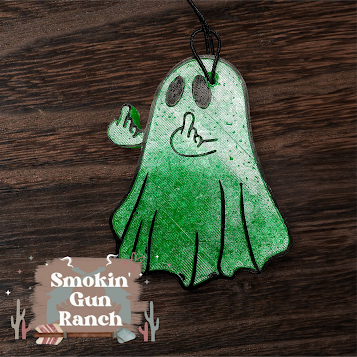 Green middle-finger ghost freshie on wood