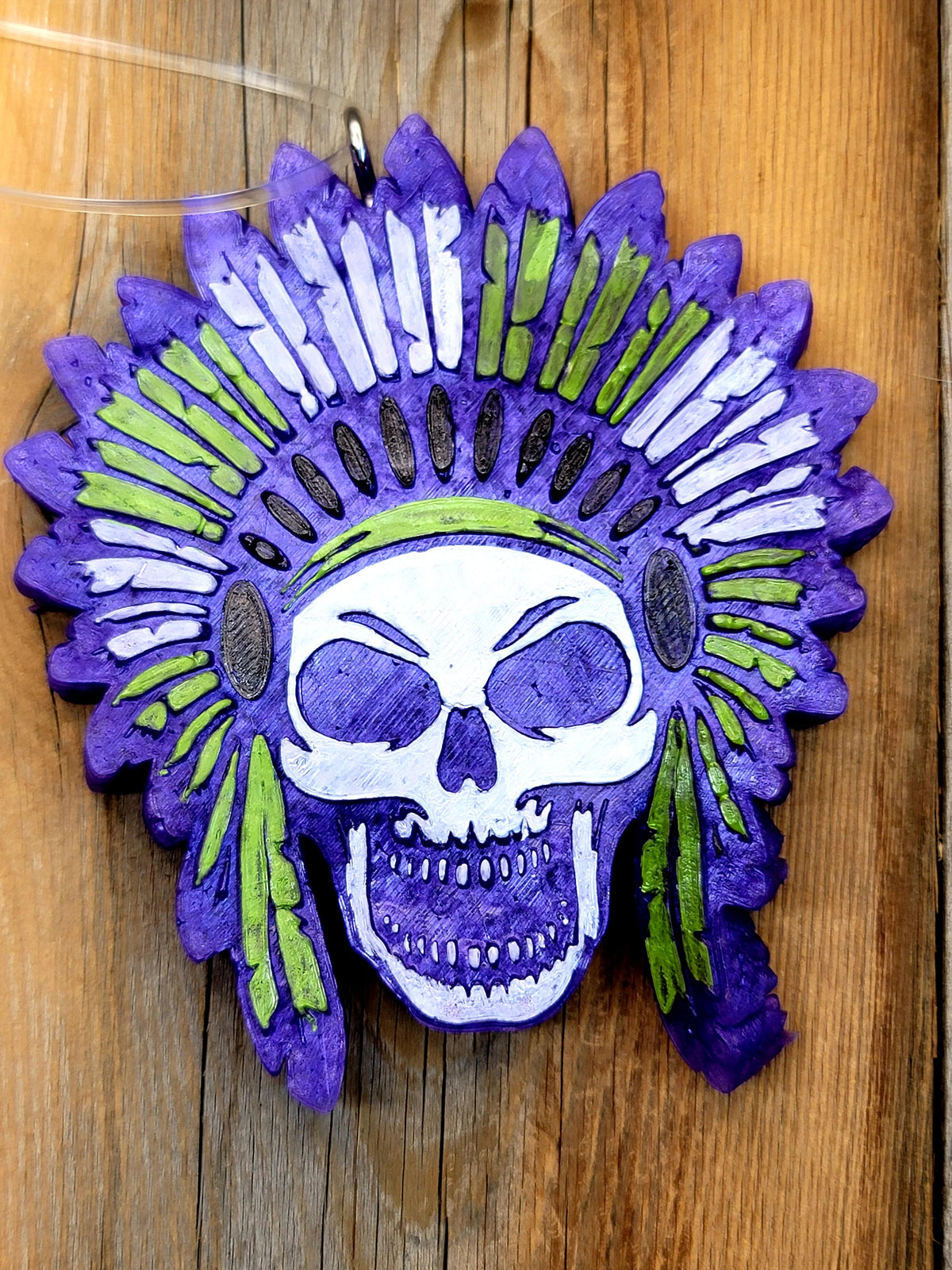 Purple and lime skull headdress freshie on wood