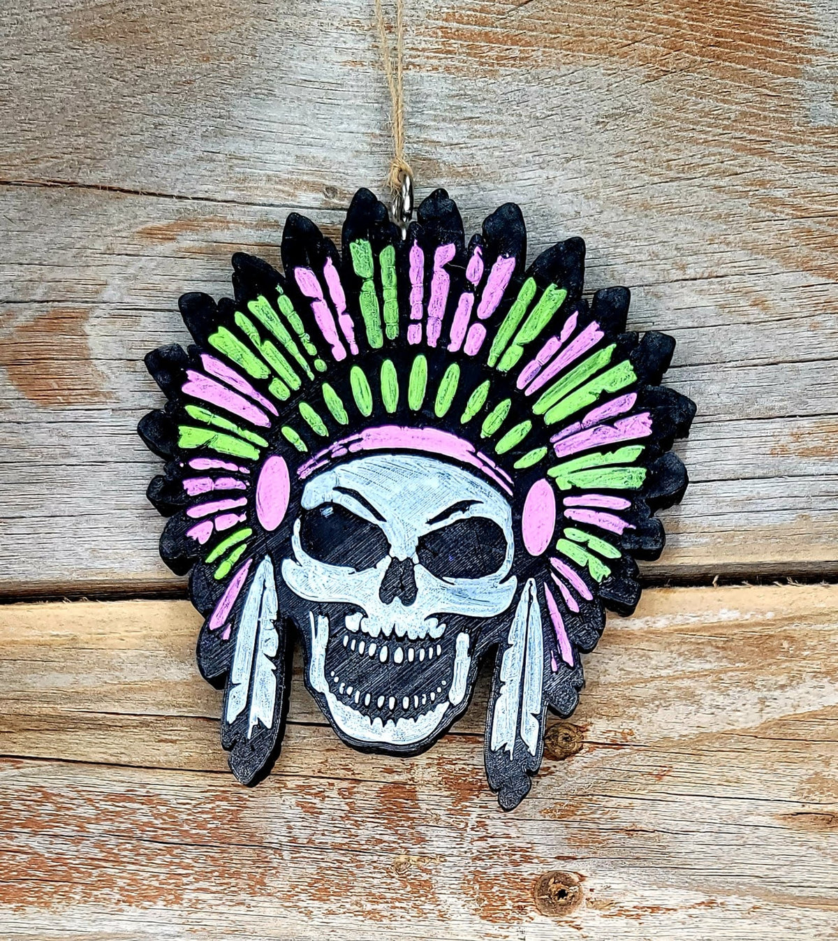 Black skull headdress freshie with pink and green feathers