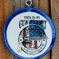 Blue round cardstock freshie with patriotic gun permit graphic