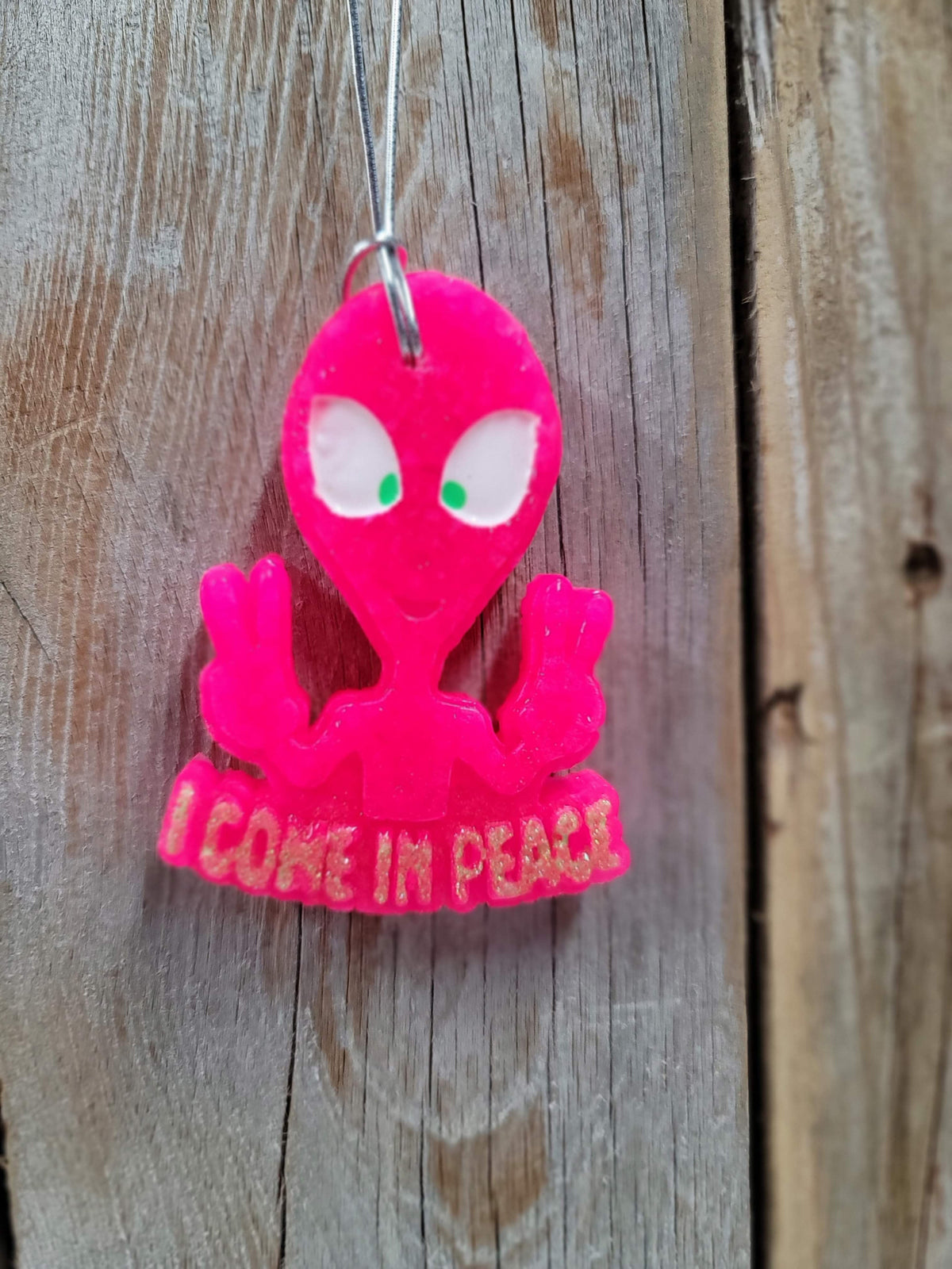 Pink alien I Come in Peace freshie on wood