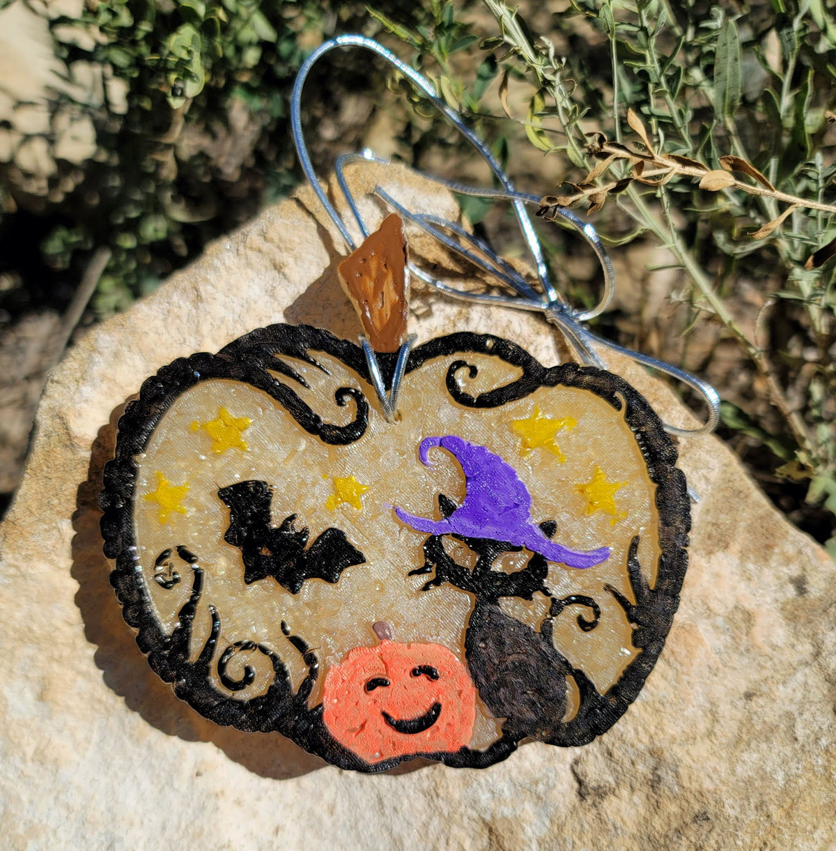 Pumpkin scene freshie with witch, black cat, bat, and jack-o'-lantern outdoors