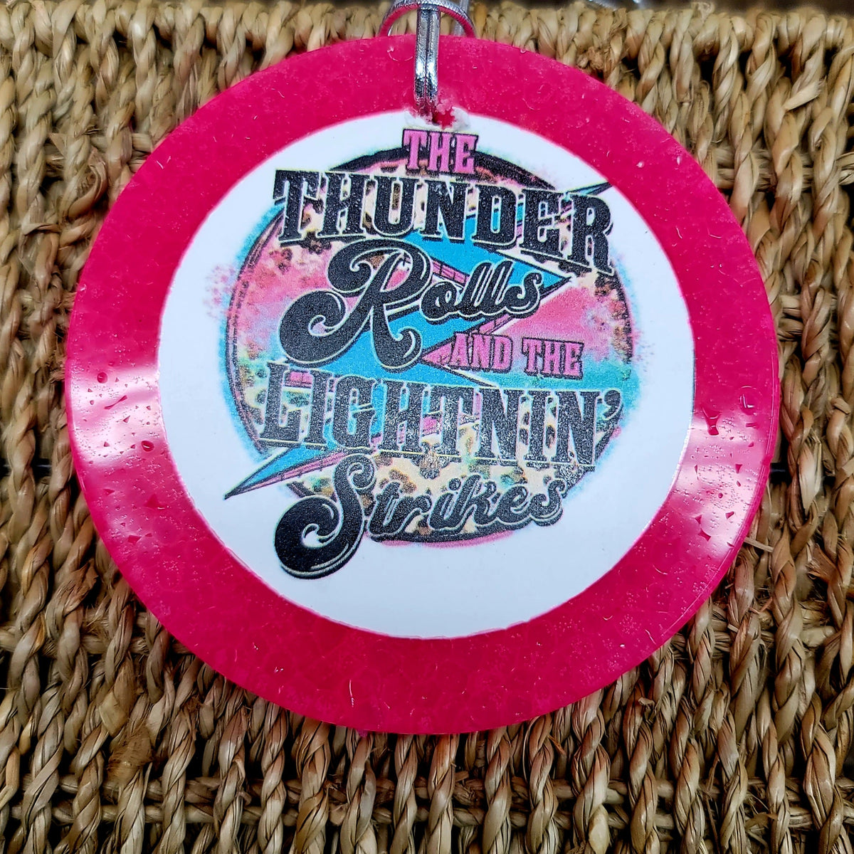 Pink round cardstock freshie with Thunder Rolls graphic