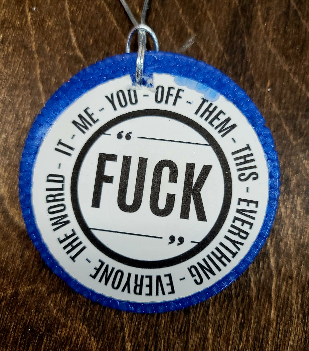Blue round cardstock freshie with profane quote graphic