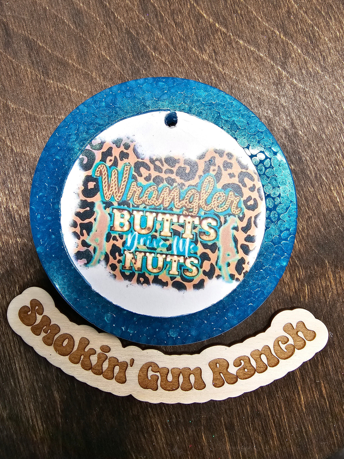 Blue round cardstock freshie with Wrangler graphic