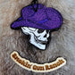 Skull cowboy freshie wearing a purple hat