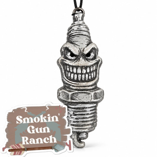 Silver skull spark plug 3D shaped car freshie on white background