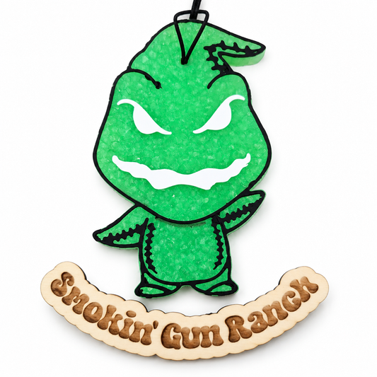Green grinning Boogie Man freshie on white background