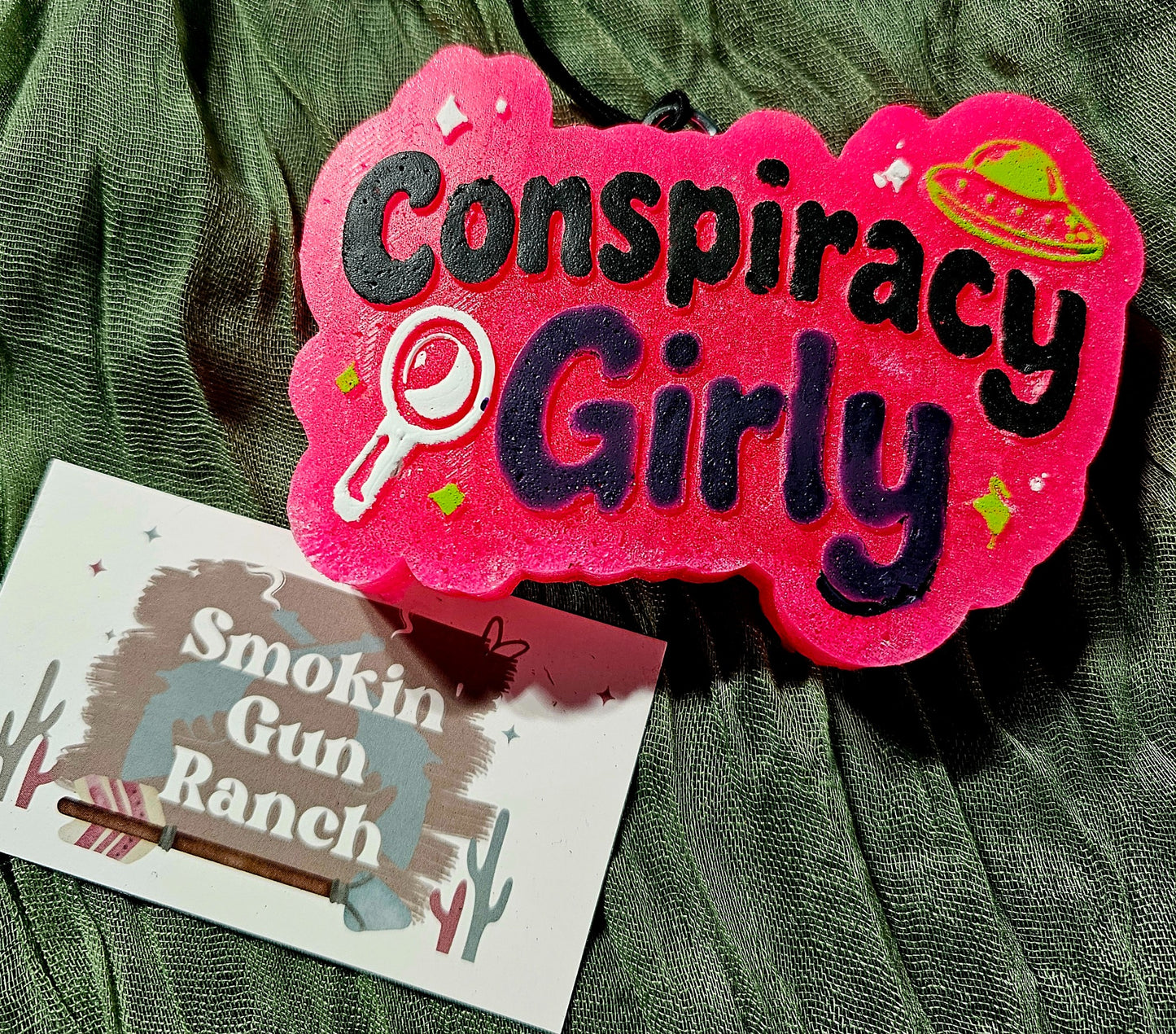 Hot pink Conspiracy Girly car freshie with UFO and magnifying glass graphics