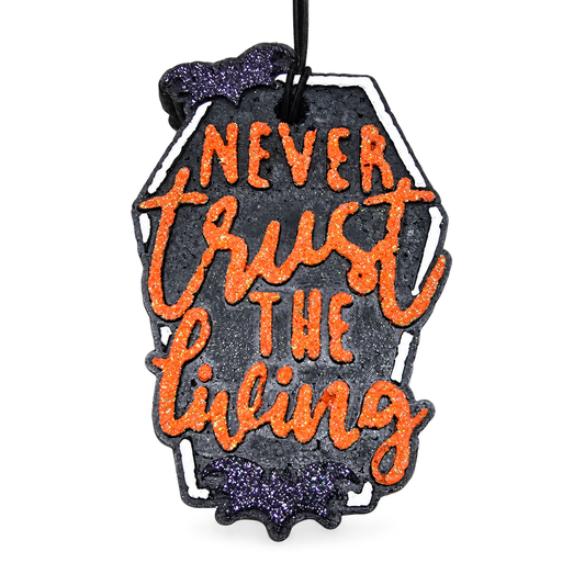 Never Trust the Living Freshie handmade car freshie on a clean white background